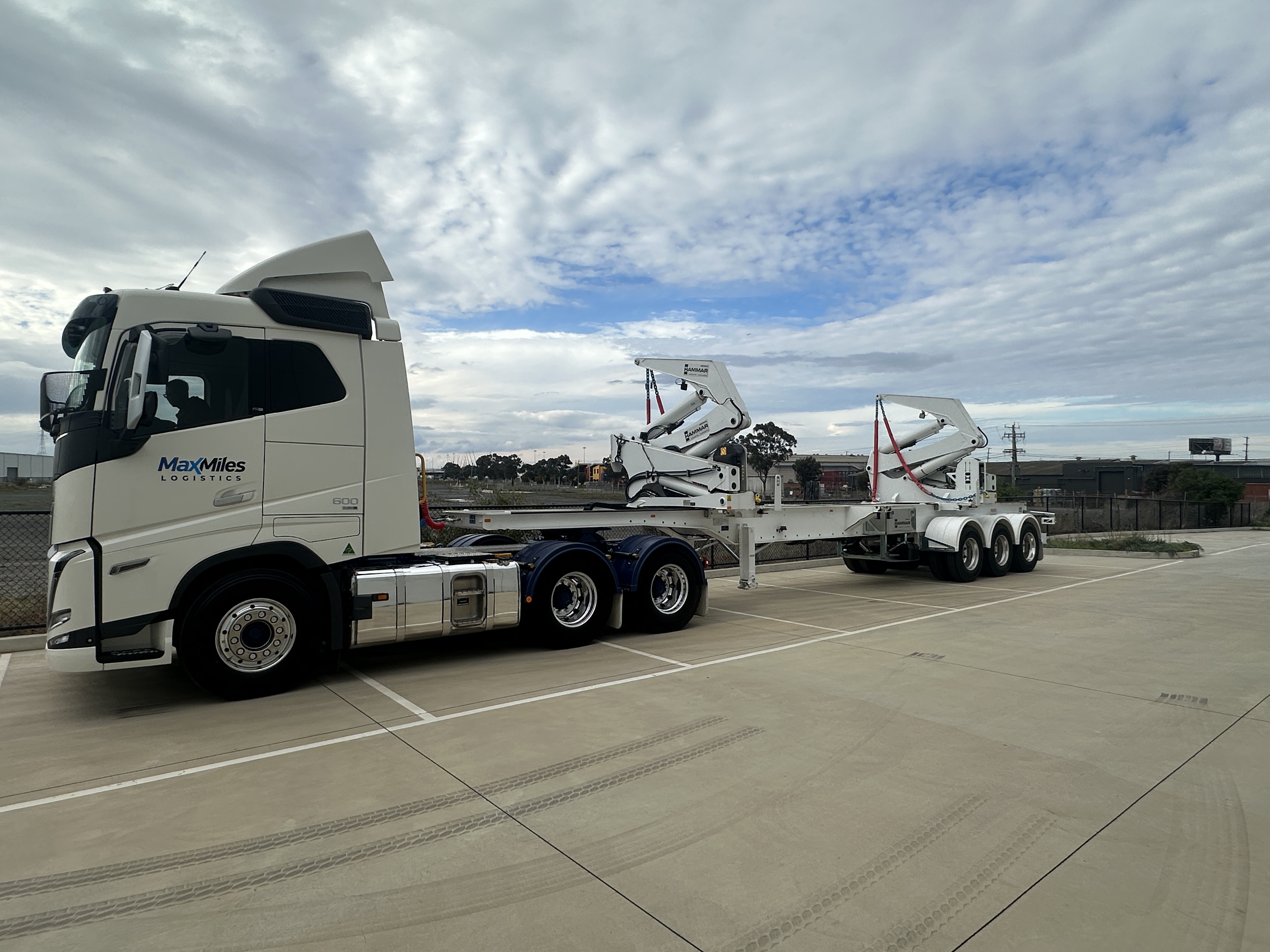 Maxmiles Logistics prime mover and sideloader equipment