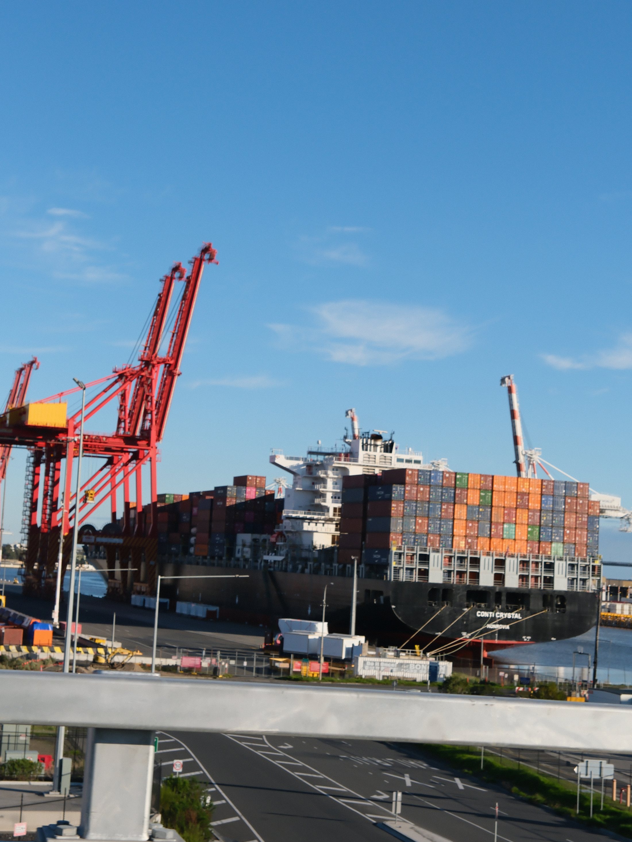 Container vessel and port cranes in Melbourne